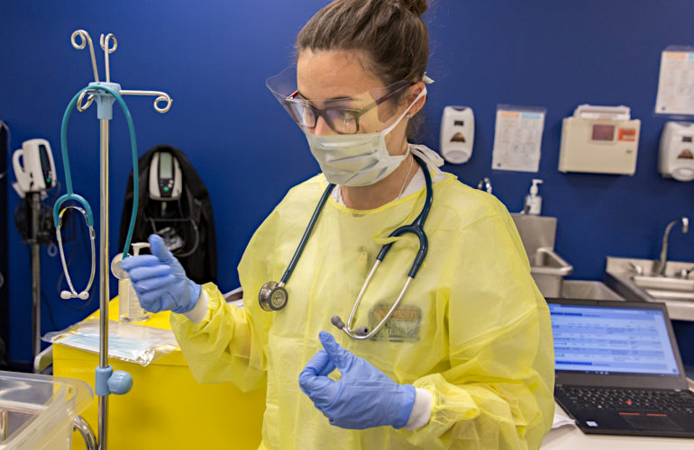 Nursing student wearing personal protective equipment.