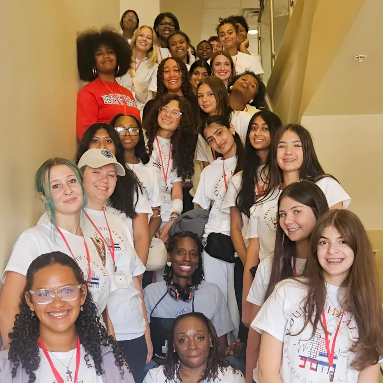 Youth Health campers gathered on stairway
