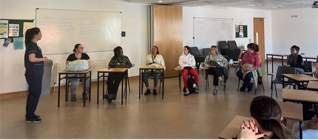 A clinical placement director at the Mater Hospital educates the UDM group on how clinical placements and education work for current nursing students at their hospital